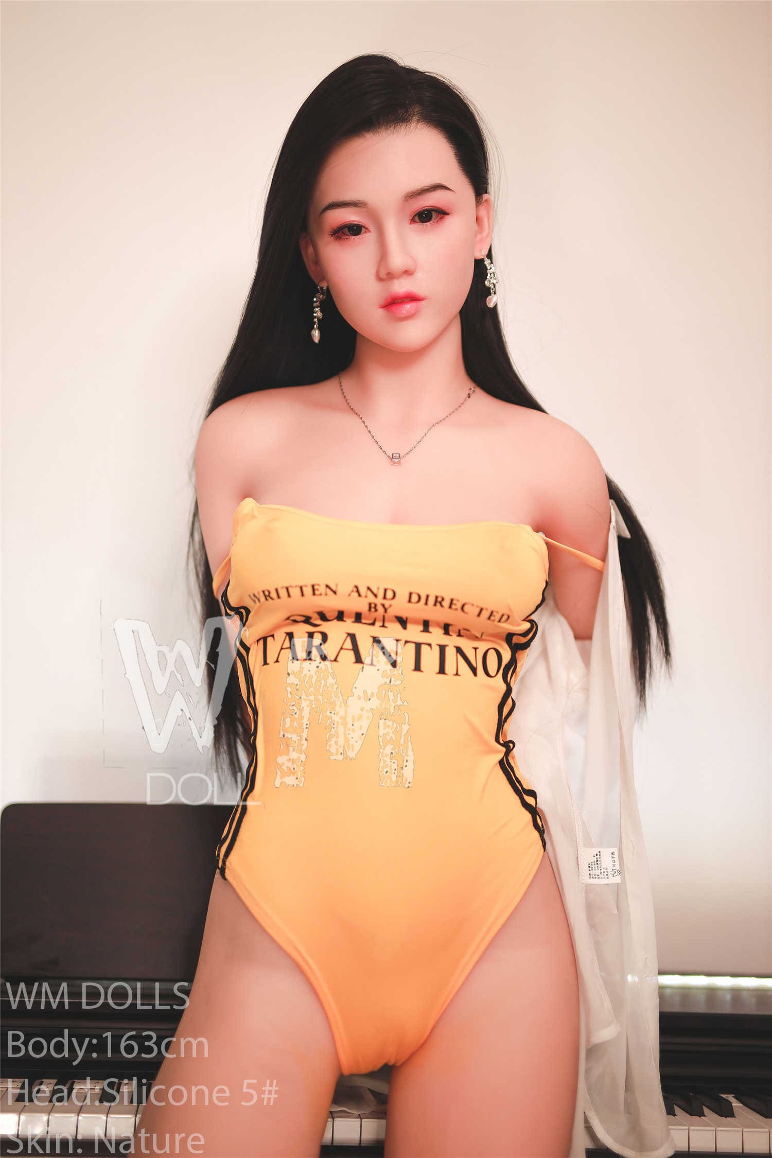 Секс-кукла Leisun фото 22 - SexDolls.com.ua Секс кукла Leisun в желтом боди